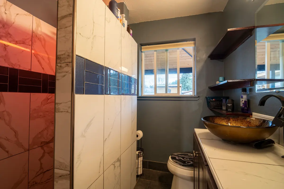 Bathroom renovation with modern finishes by Munro Residential