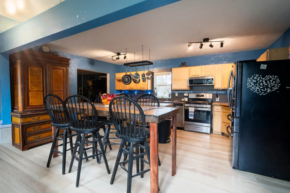 Modern kitchen and dining room remodel by Munro Residential